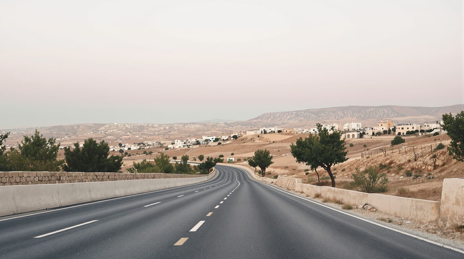 Illustration of an empty road through terraced olive hills near Hebron at dawn, with a stone hillside town on a distant ridge.