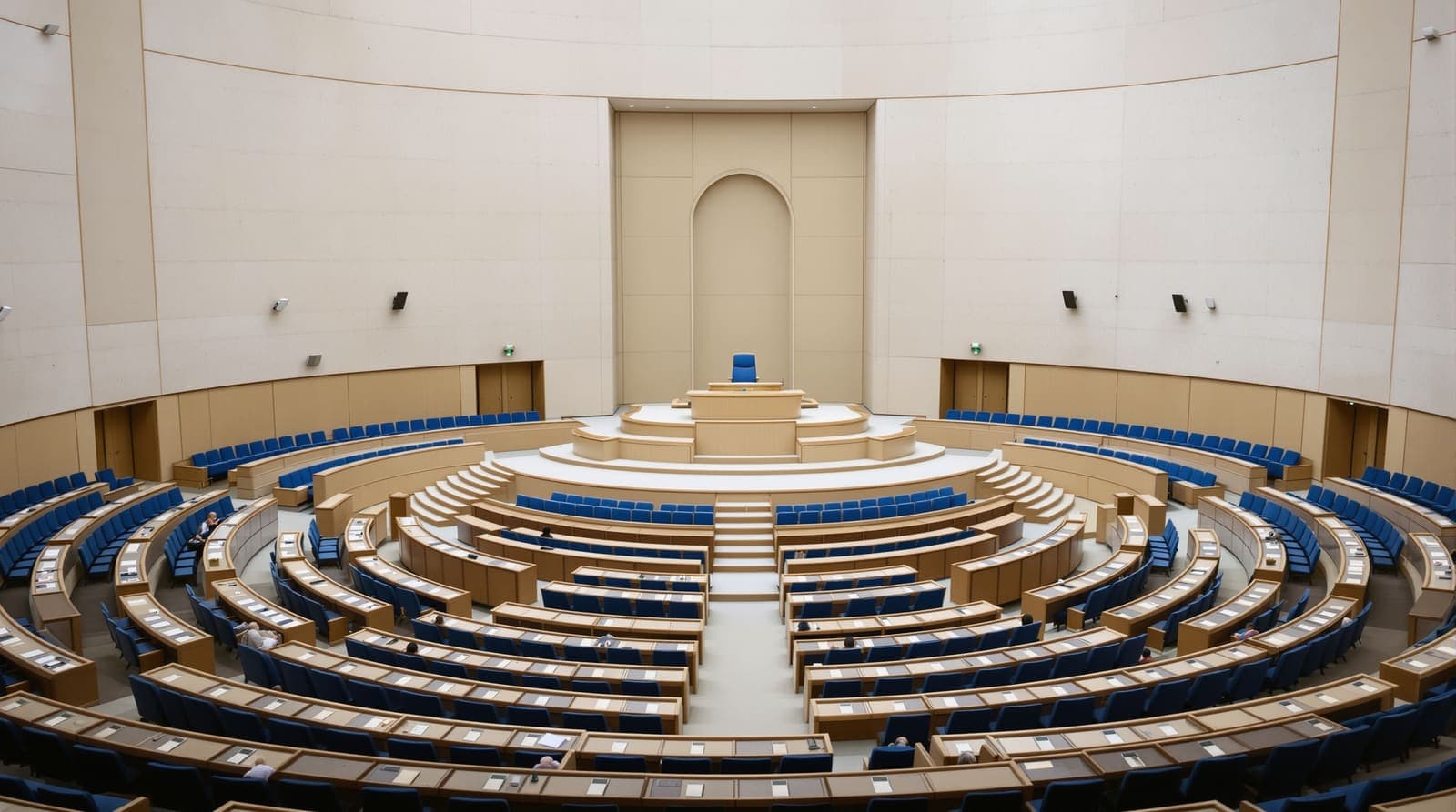 Illustration of an empty parliamentary plenum chamber seen from the gallery, with the speaker's dais and vacant seats in soft daylight