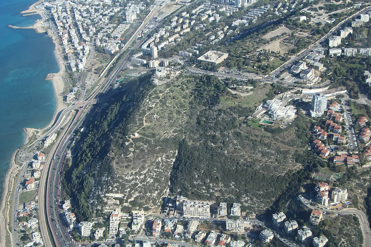 The Carmel headland above Haifa's shore from the air, the monastery at the top of the slope